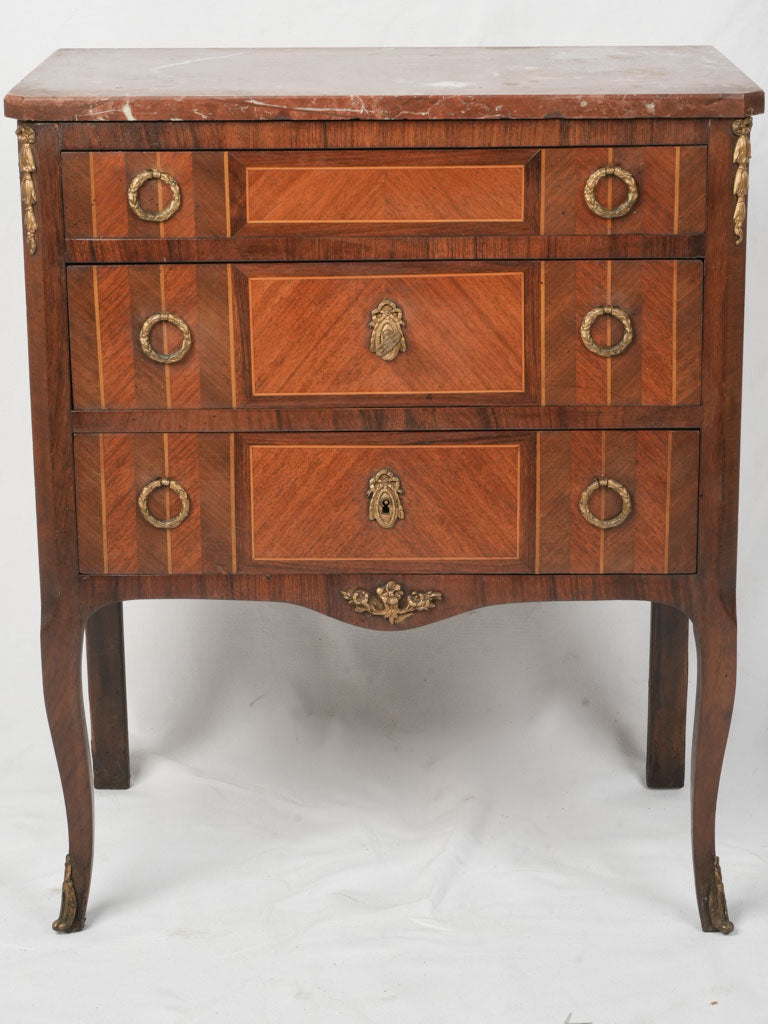 Sophisticated marquetry accent chest  