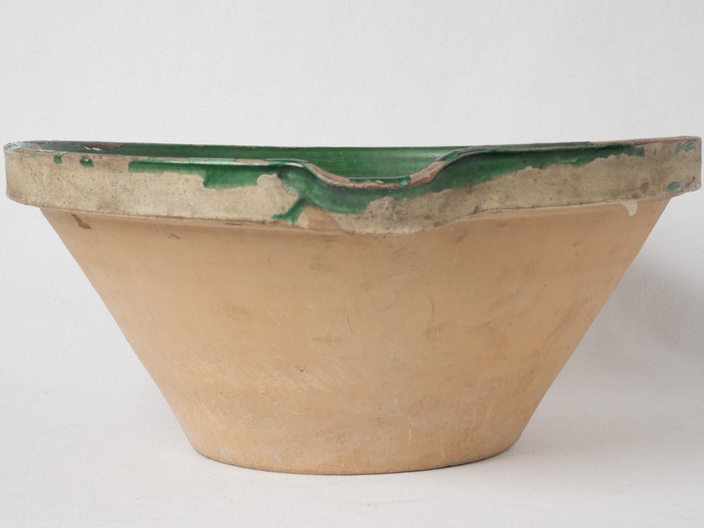 Weathered large green glazed ceramic bowl