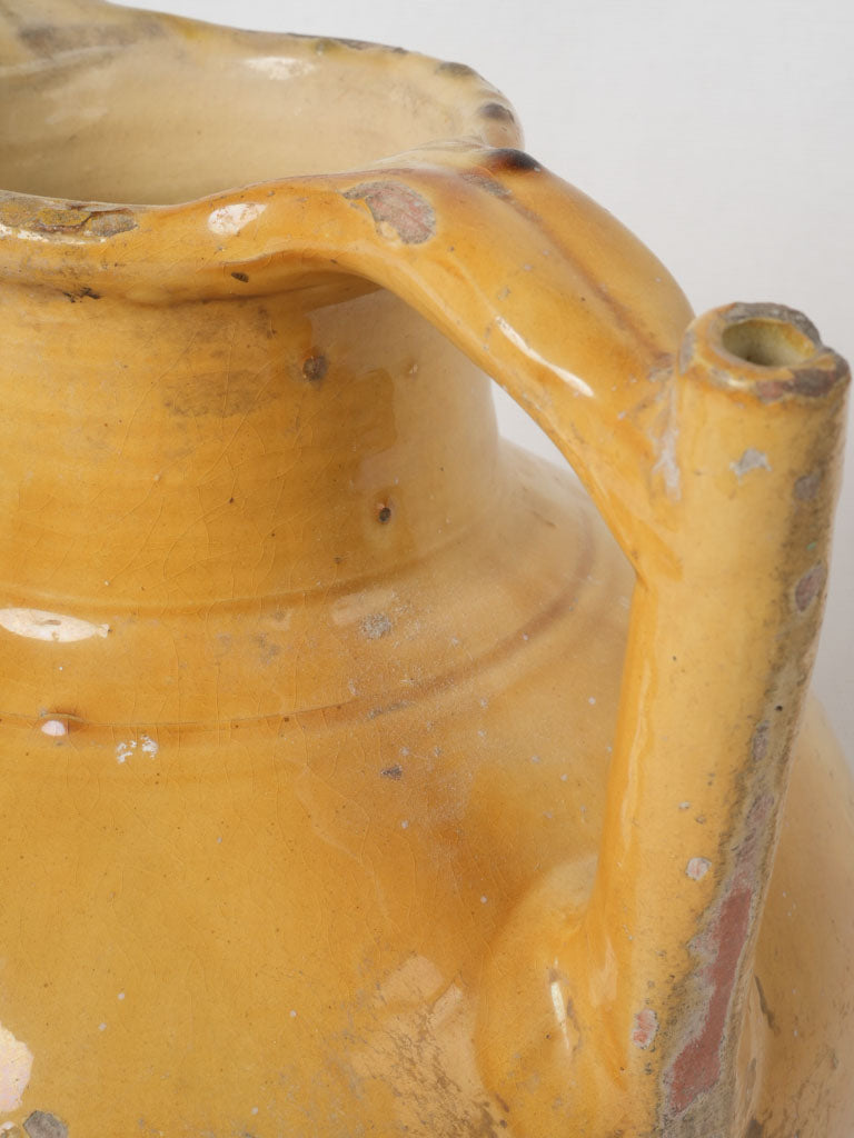 Textured aged terracotta water jug