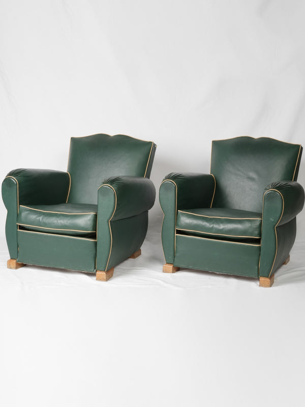 Vintage green faux leather club chairs