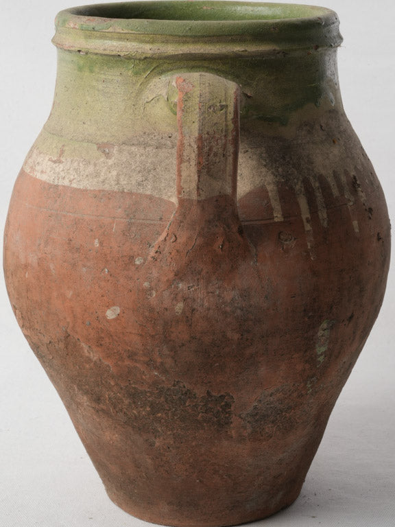 Antique green-glazed clay jar