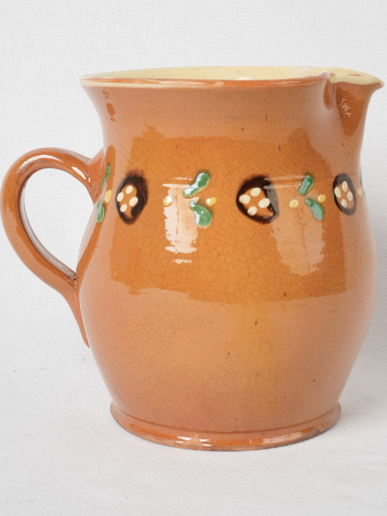 Rustic brown spotted water pitcher