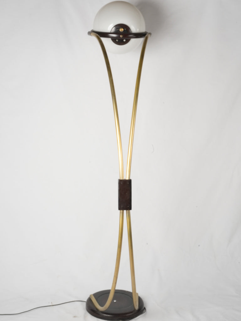 Gold-finished metal futuristic floor lamp