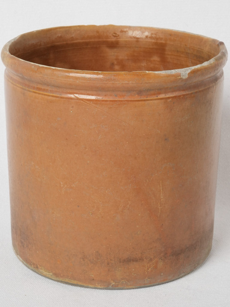 Century-old caramel-colored antique vase