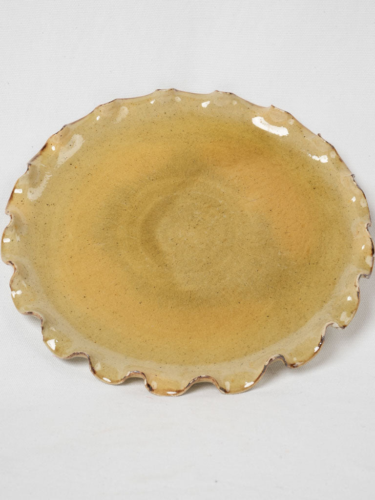 Aged yellow ocher glazed cake plate