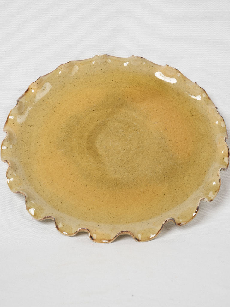 Platter w/ pretty rippled edge & yellow ochre glaze 12½"