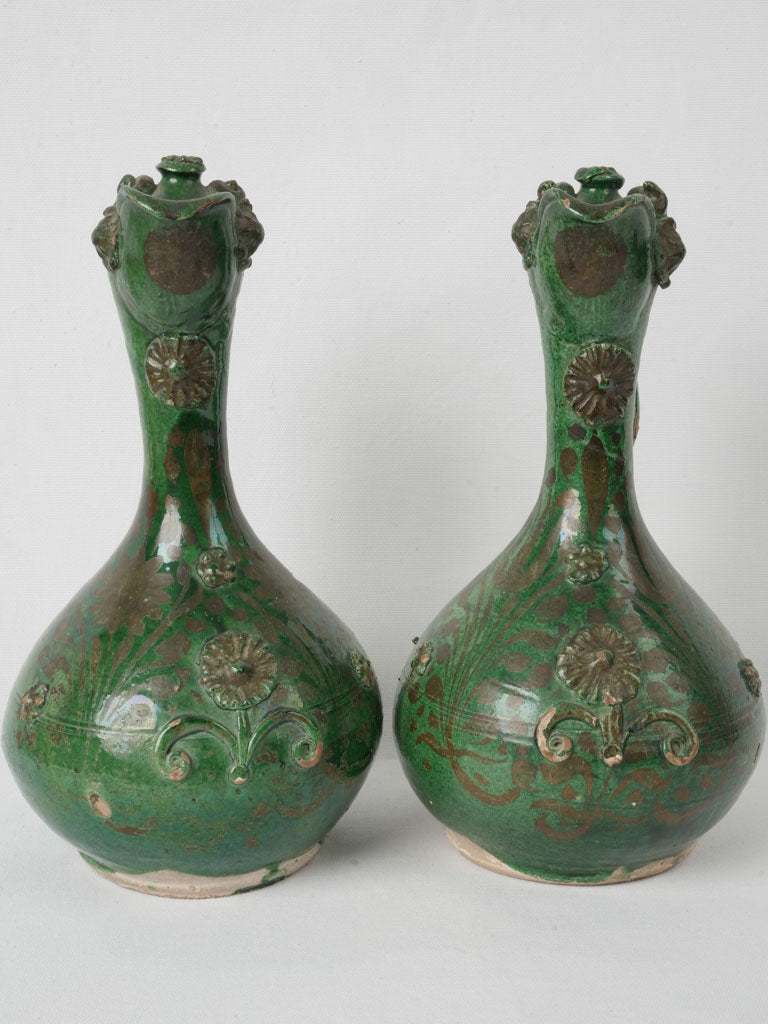 Ornate relief decorations Raki pitchers