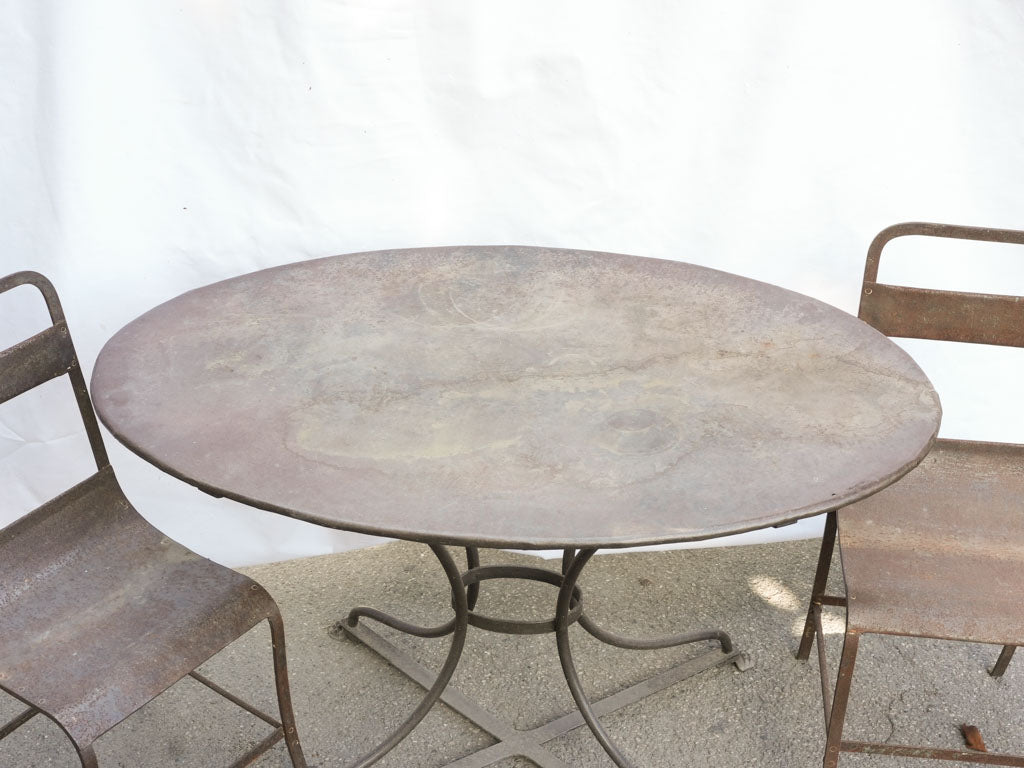 Oval garden table w/ two iron chairs 47¼" x 30"