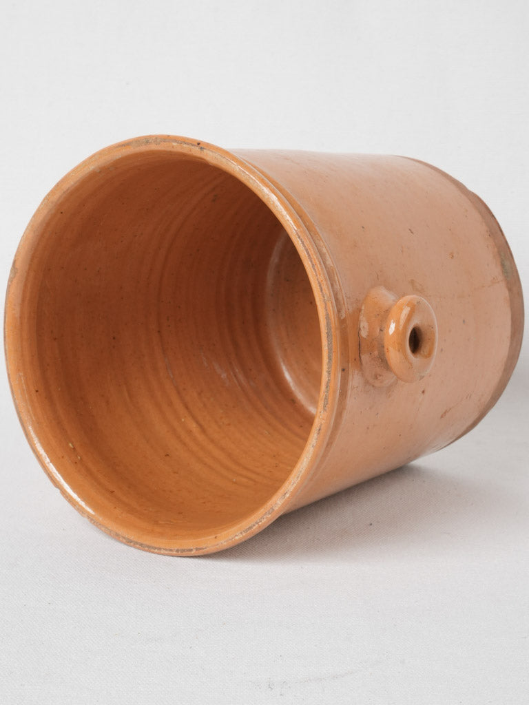 Rustic ocher-glazed earthenware jar