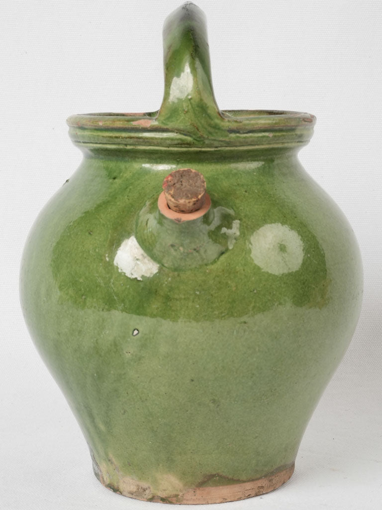 Early twentieth-century green glazed pitcher