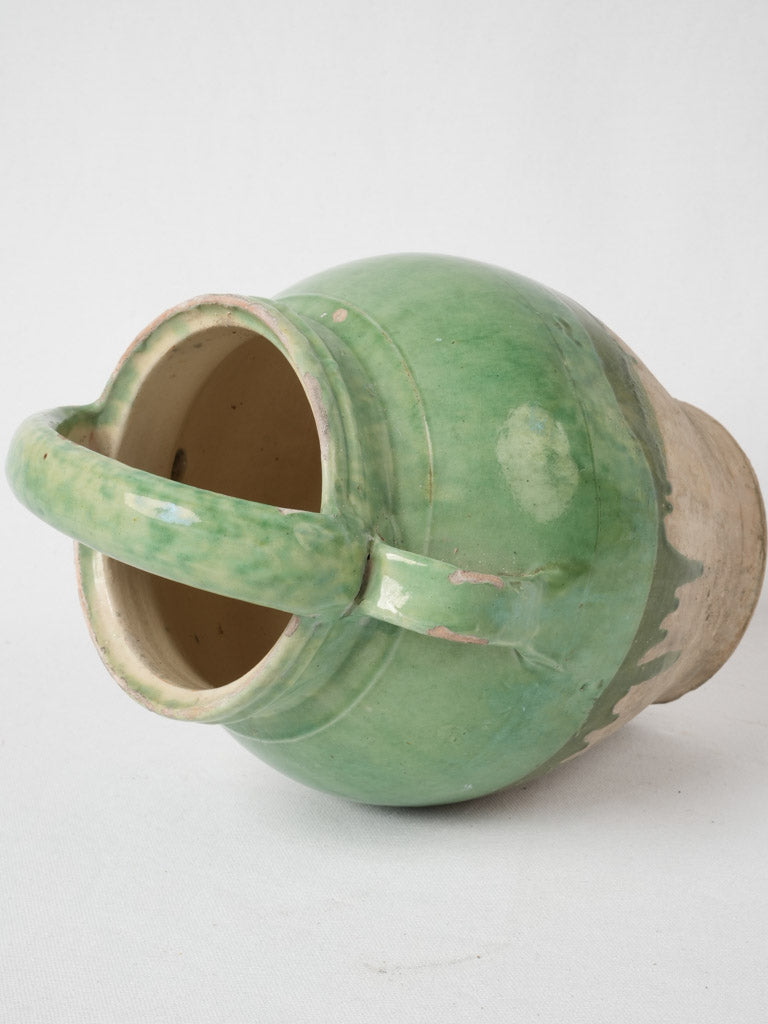 Collectible green glazed water cruche