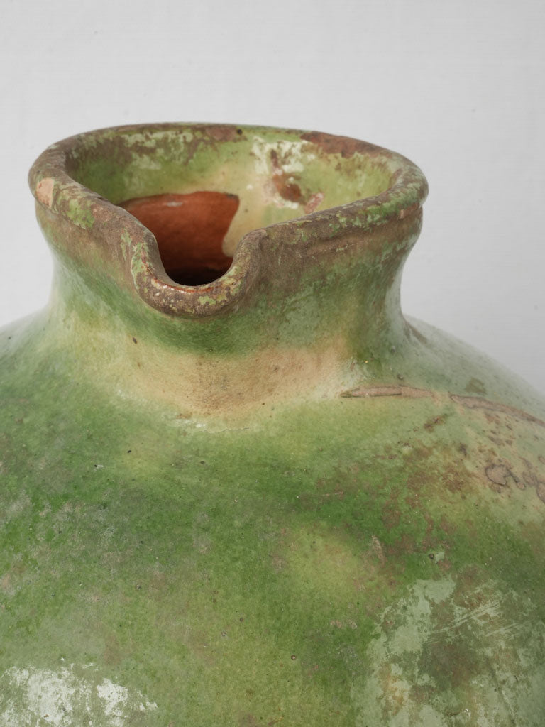 Full-bodied antique water jug  