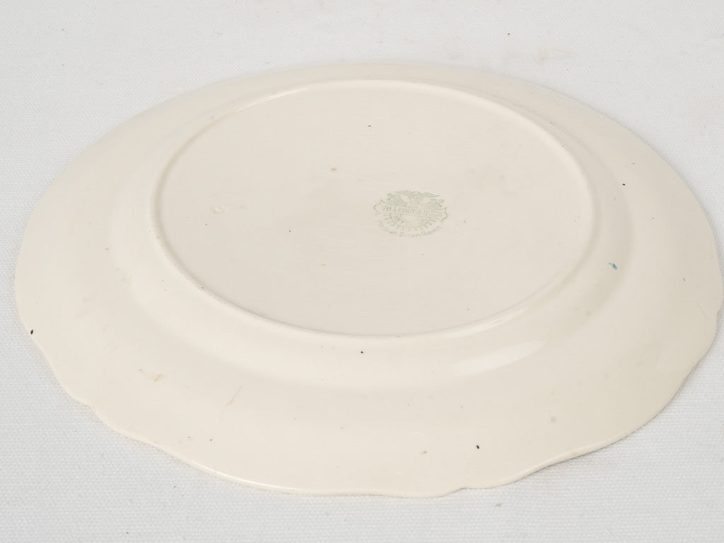 Scalloped edge ceramic decorative plate