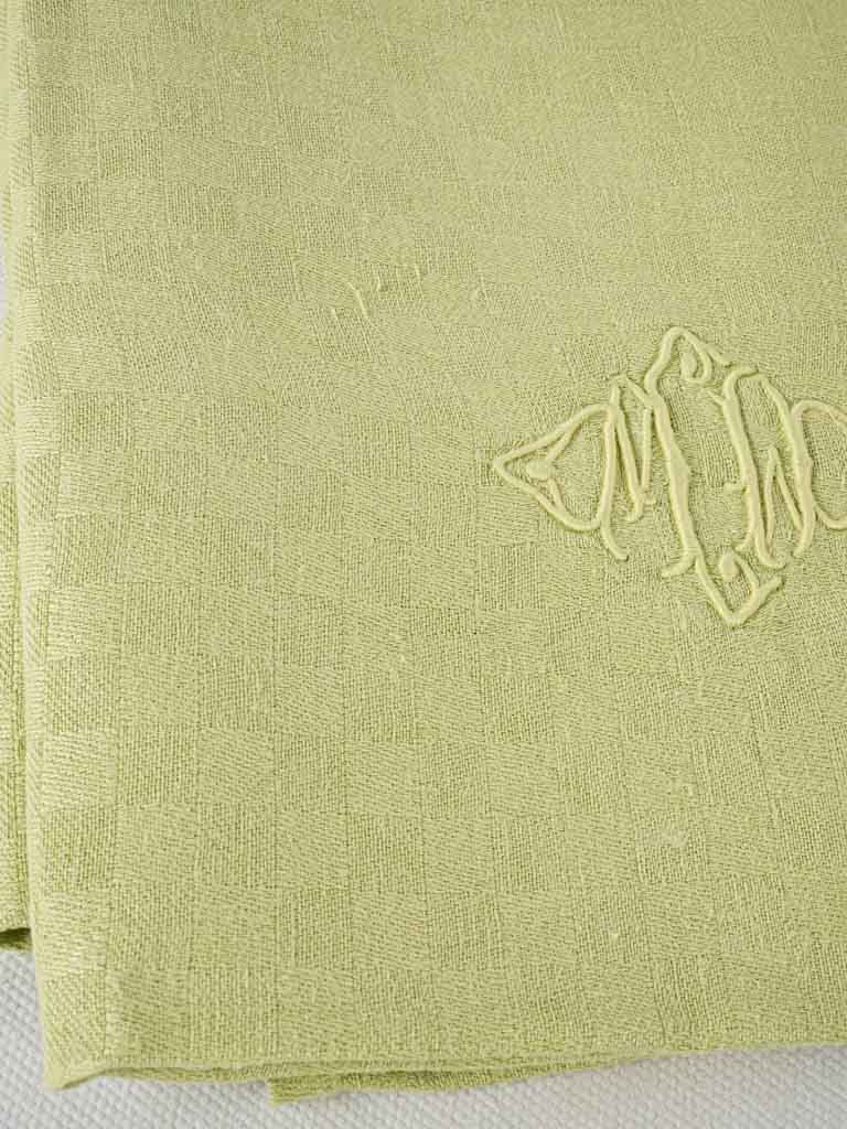 Distinctive pea-green antique table linens