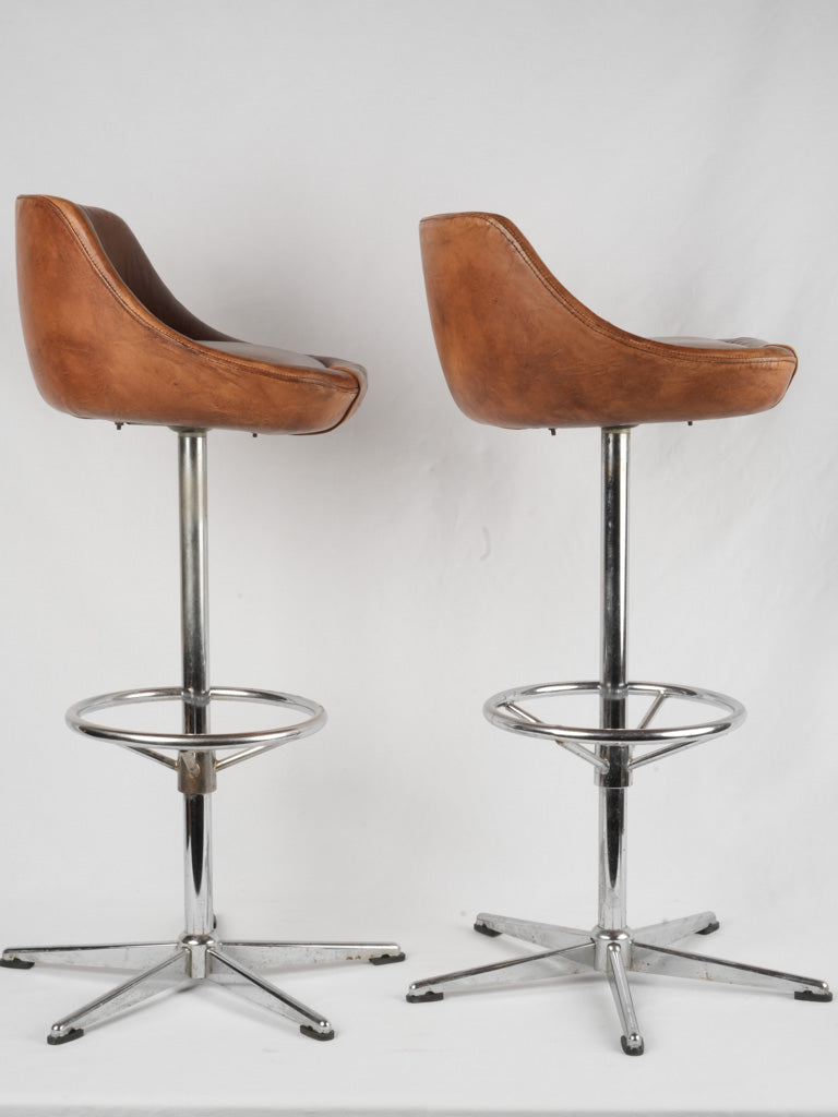 Upholstered chestnut leather barstools, 1970s