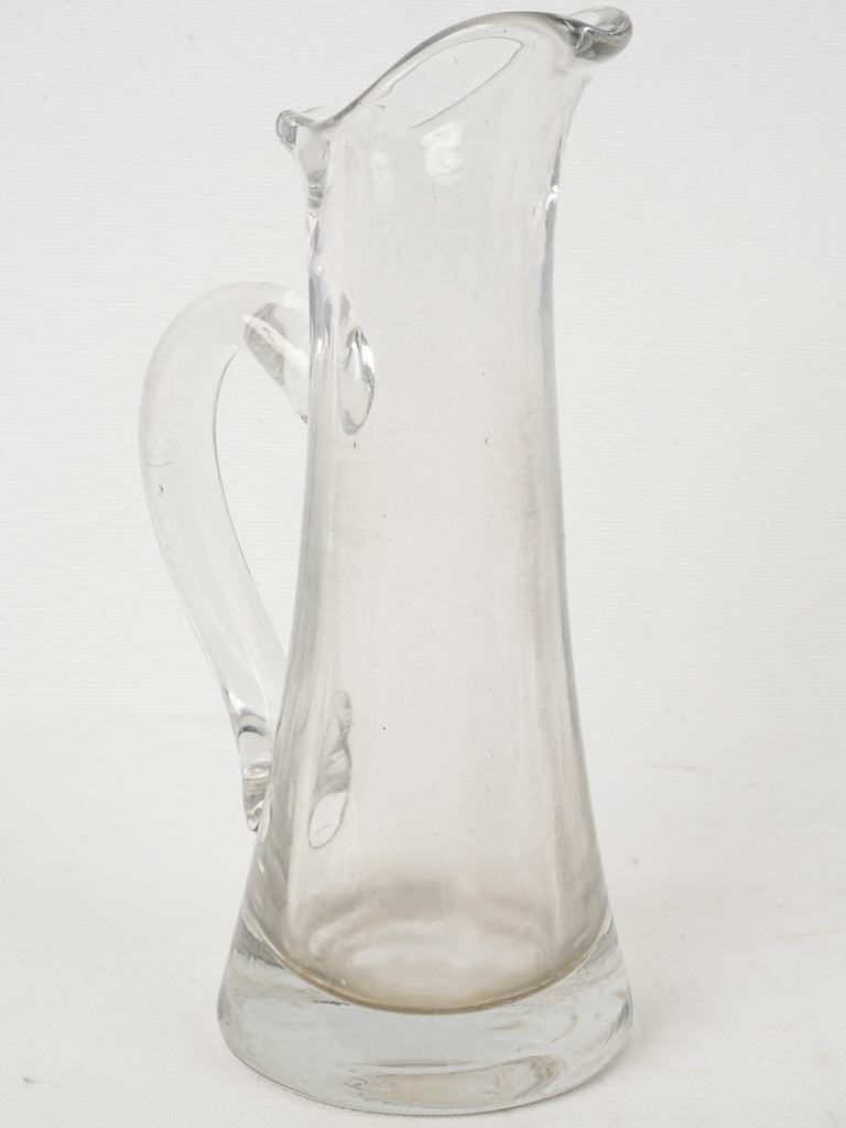 Vintage bistro-style glass cider jug