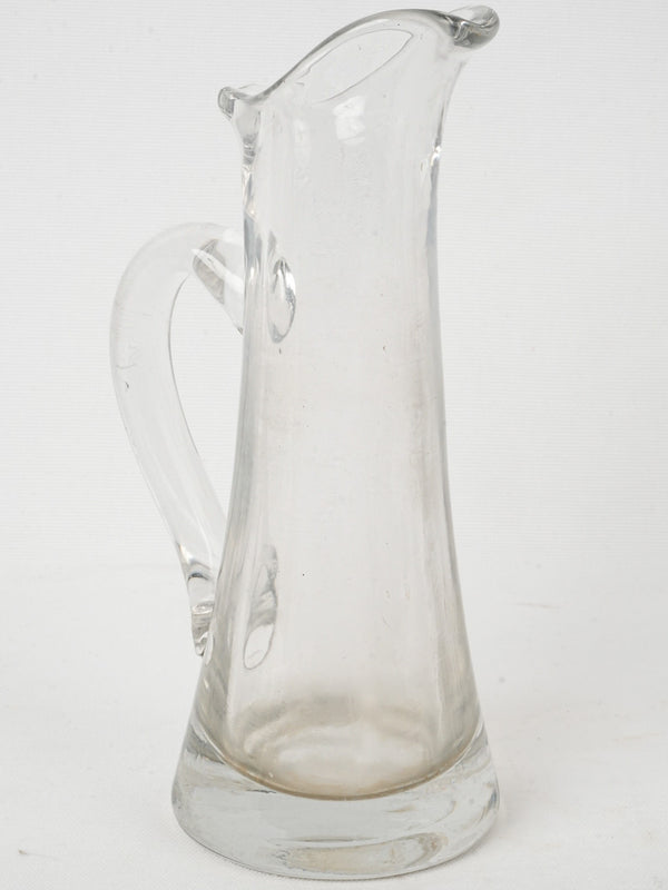 Vintage bistro-style glass cider jug