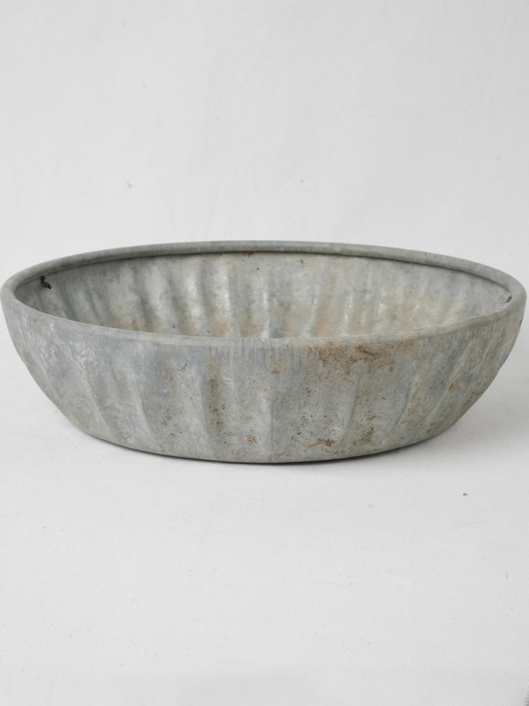 Industrial fluted gray zinc bowl