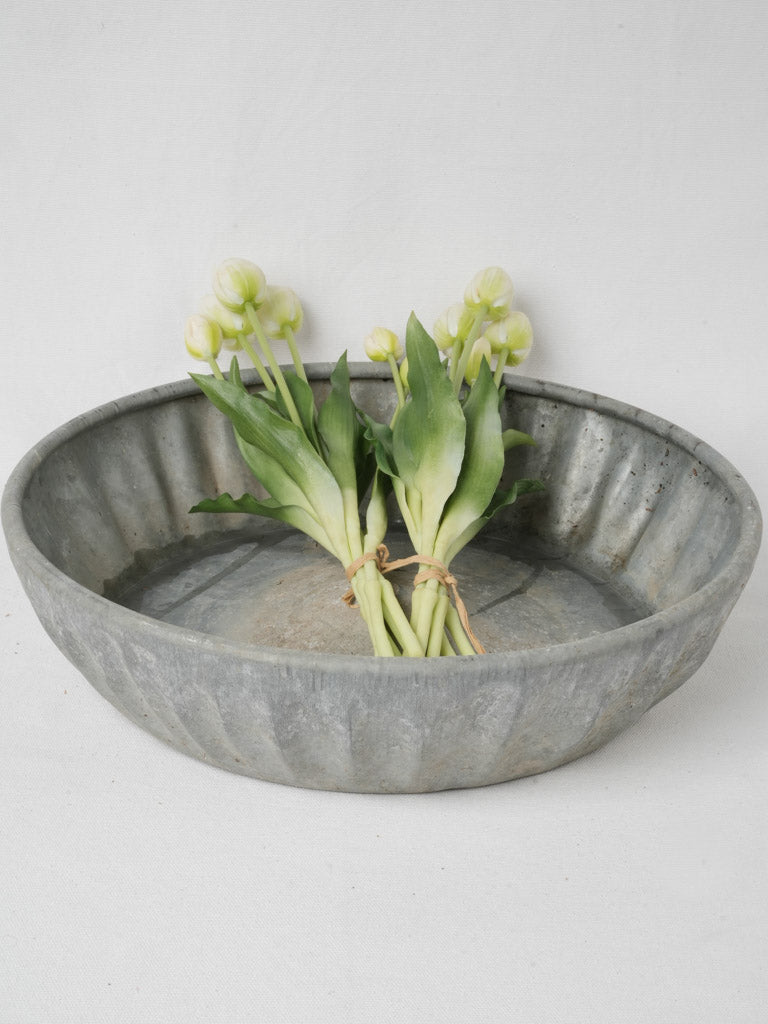 Textured utilitarian zinc basin