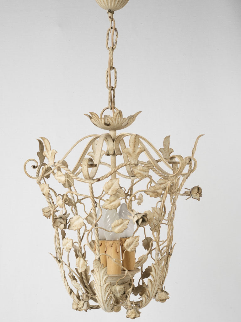 Weathered lantern with floral detailing