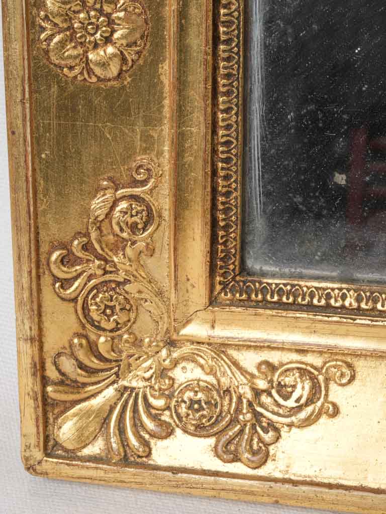 Mercury, two-paned, ornate, gilded mirror