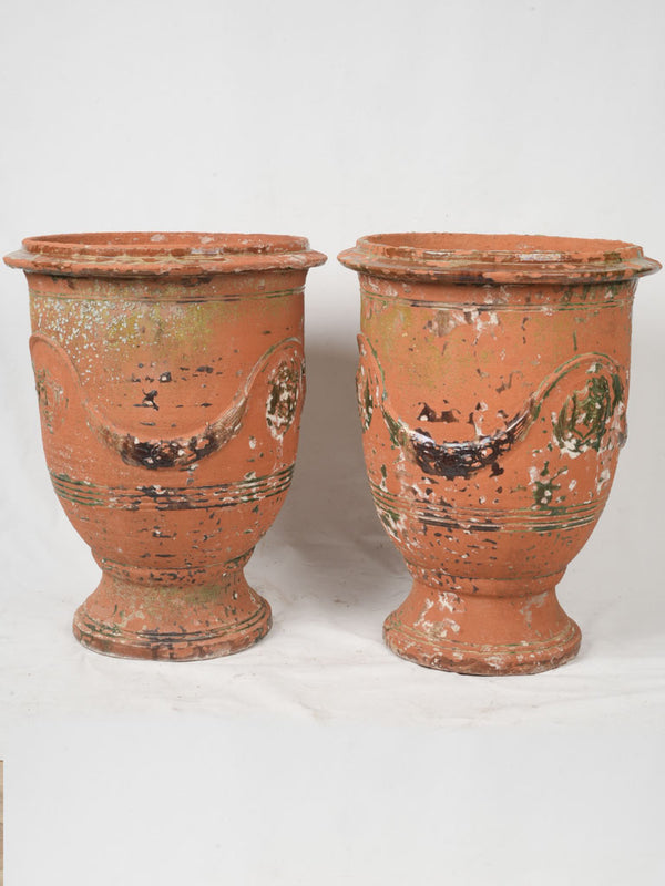 Distinctive, weathered, glazed terracotta planters