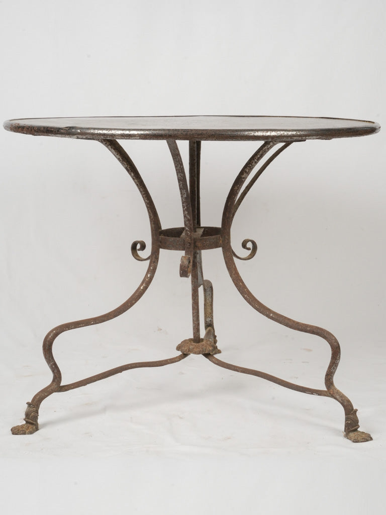 Antique Arras region paw-foot table