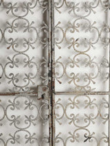 Worn decorative wrought iron entryway