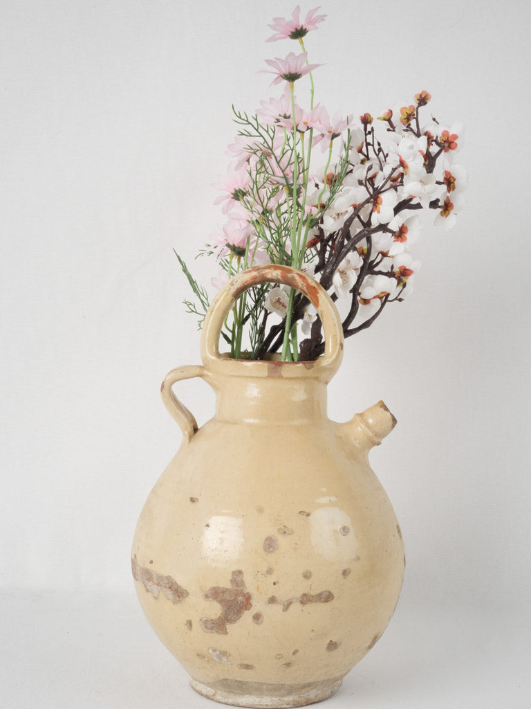 Pale yellow glazed vintage ewer