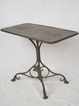 Antique wrought-iron garden table 