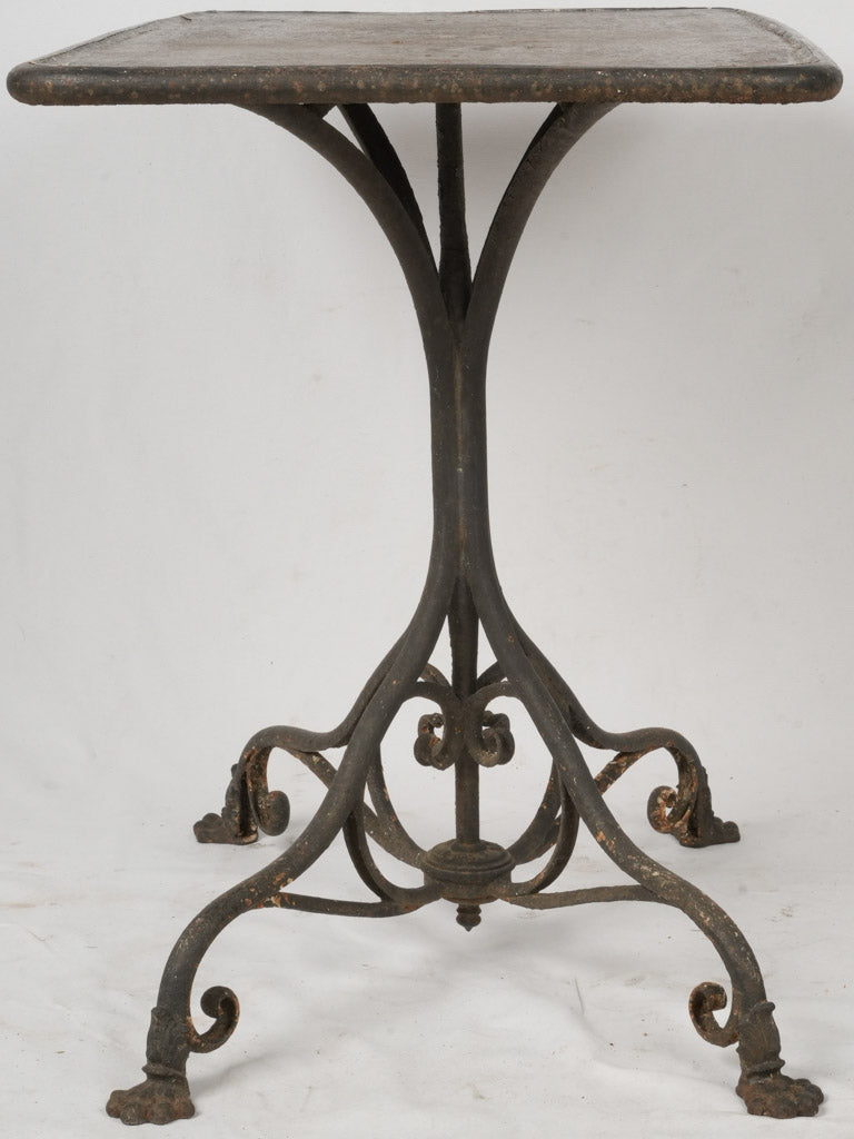 Intricate Arras wrought iron table 