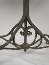 Ornate 19th-century wrought-iron garden table 