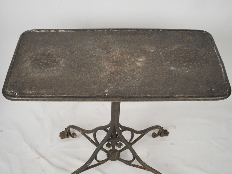 Stylish vintage wrought-iron patio table 