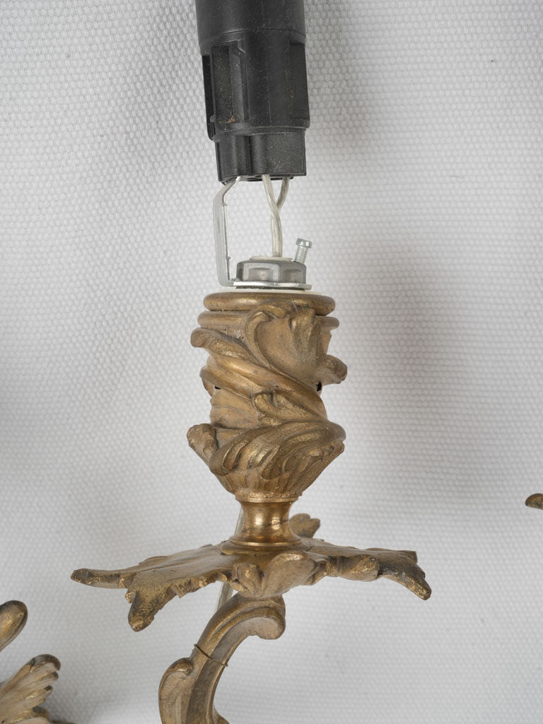 Elegant two-light gilded sconces