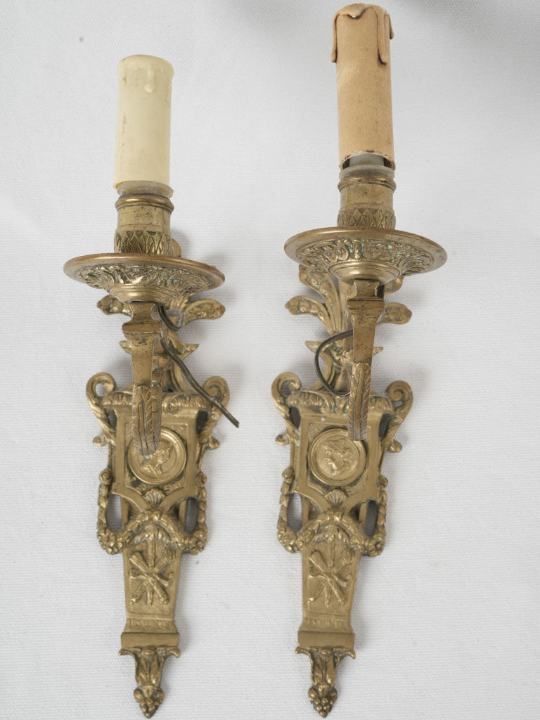 Intricate, antique single light wall sconce 