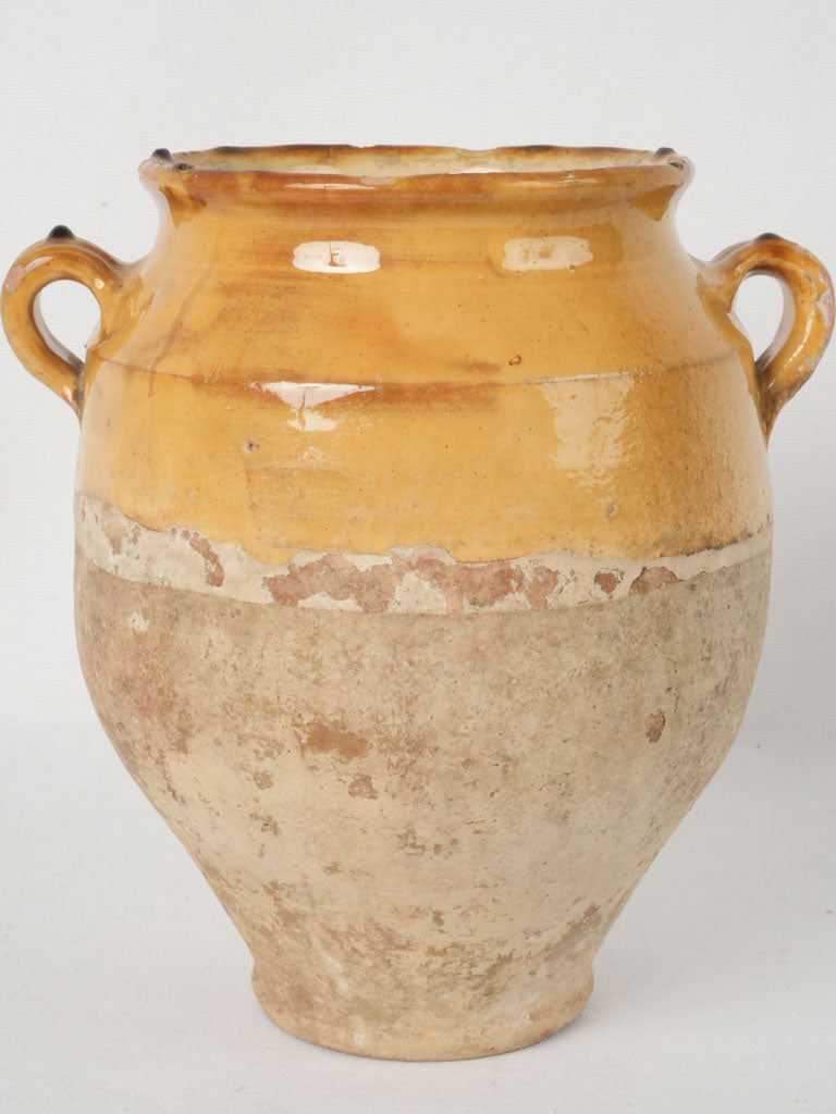 Rustic, timeworn, glazed, French confit pot