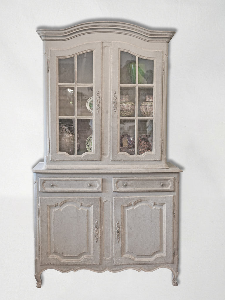 Timeworn and ornate display cabinet