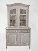 Timeworn and ornate display cabinet