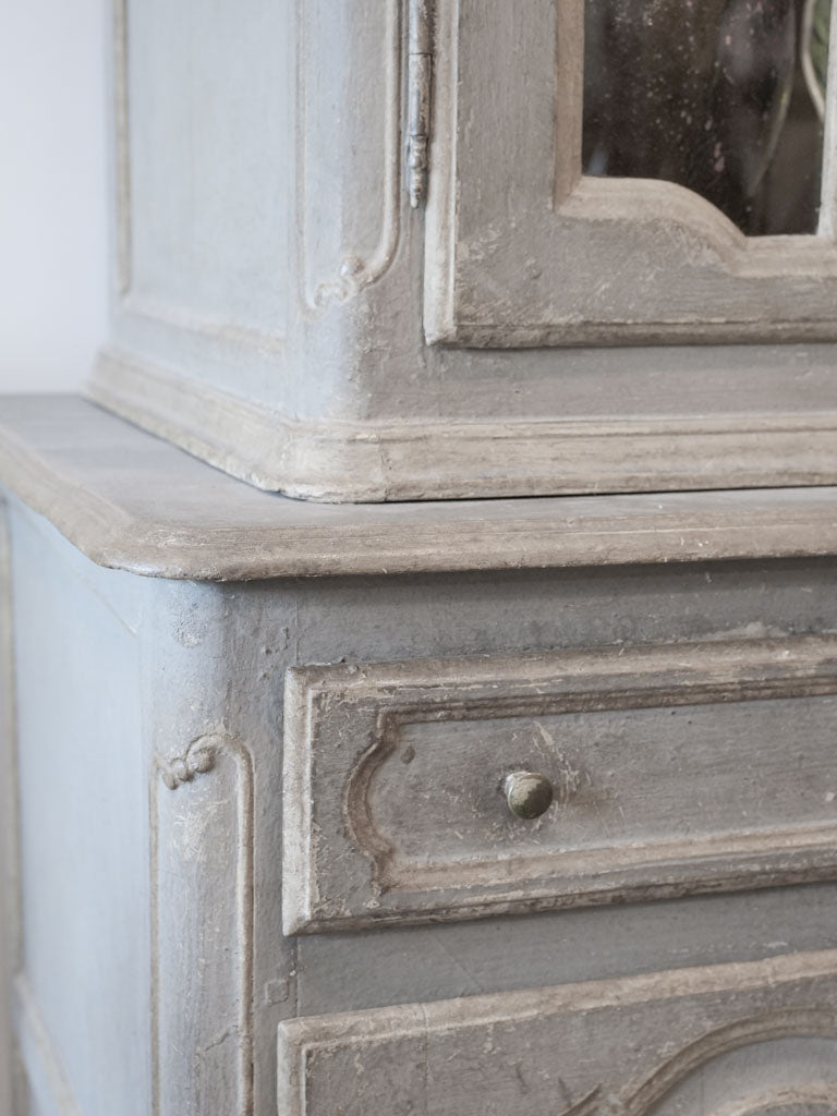 Refined beige French display cabinet