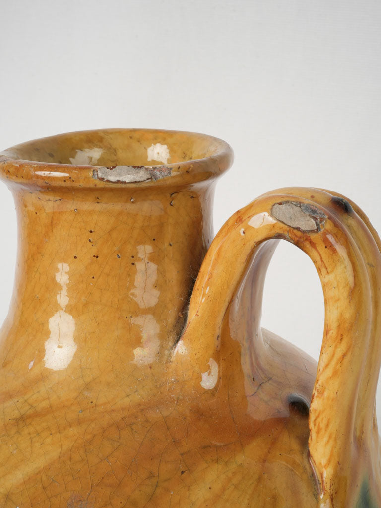 Weathered, classic Provençal wine jug