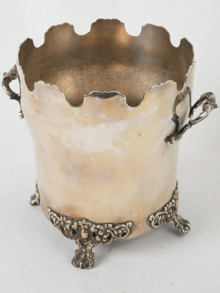 Ornate, footed, vine-detailed ice bucket