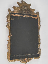 Regal eighteenth-century powder room mirror