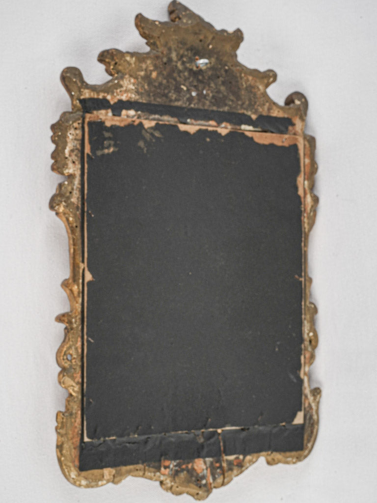 Regal eighteenth-century powder room mirror