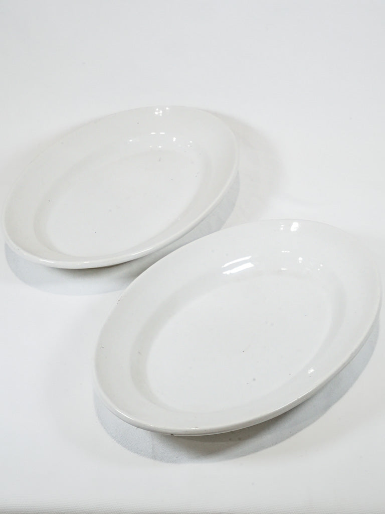 Elegant French antique white earthenware platters