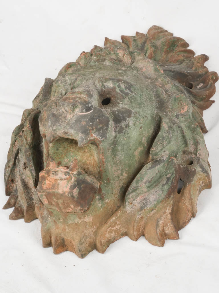 Aged Parisian bridge lion ornament