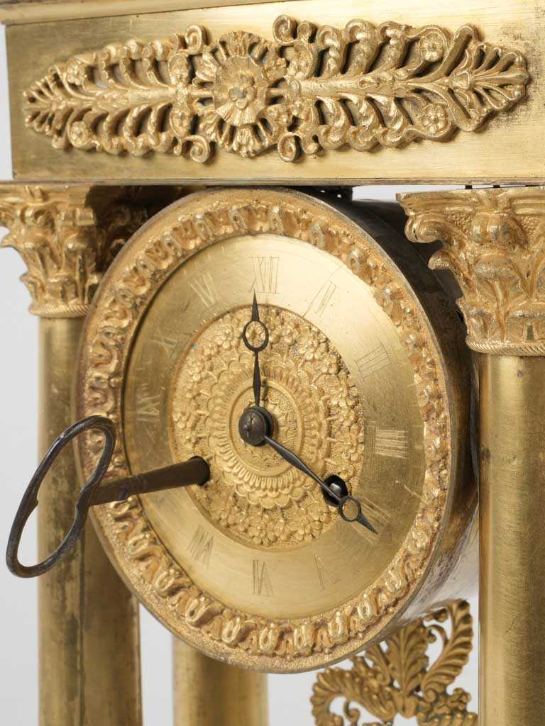 Regal Corinthian columned ormolu clock