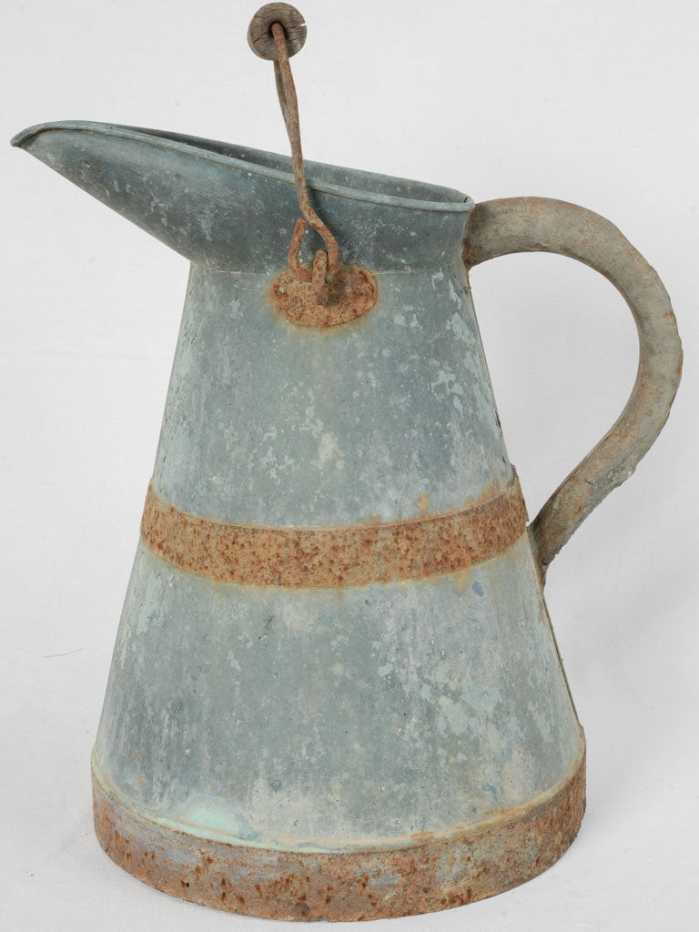 Timeworn Iron Handle Milk Jug