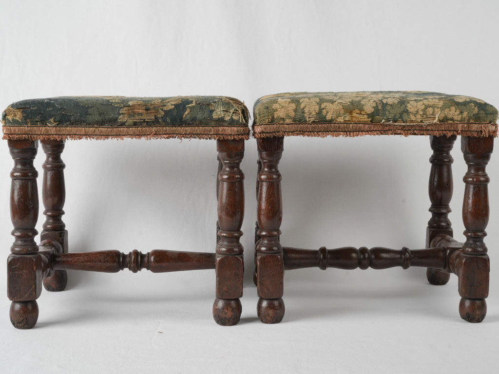 Elegant walnut and tapestry footstools