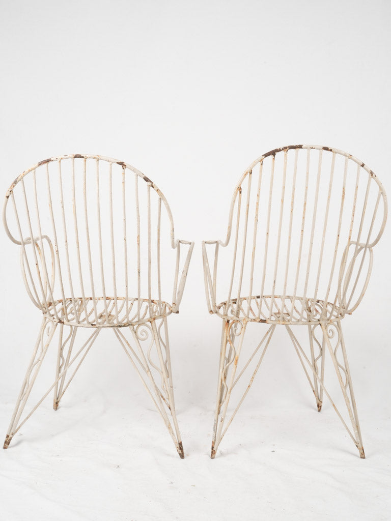 Charming 1950s white iron chairs