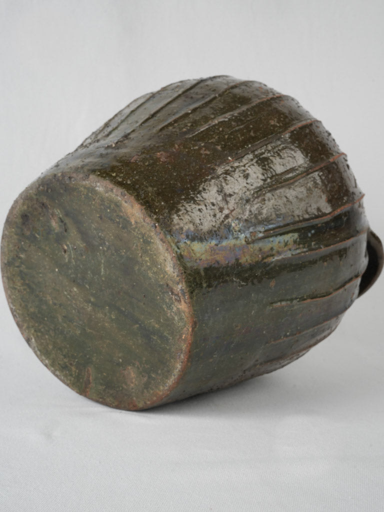 Aged Auvergne region oil container